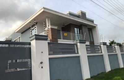 Check out this 5-bedroom house with a 1-bedroom staff quarters for sale at Spintex!