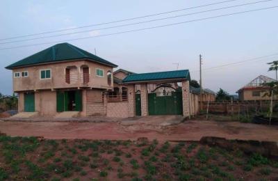 6 bedrooms and 8 washroom and 3 stores for sale at Adjen kotoku by Accra Compost and recycling plant
