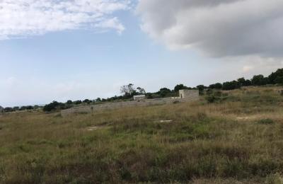 TITLED AND SERVICED HALF PLOT PLUS FREE DOCUMENTS @ PRAMPRAM ZION CITY