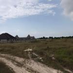 TITLED AND SERVICED HALF PLOT PLUS FREE DOCUMENTS @ PRAMPRAM ZION CITY